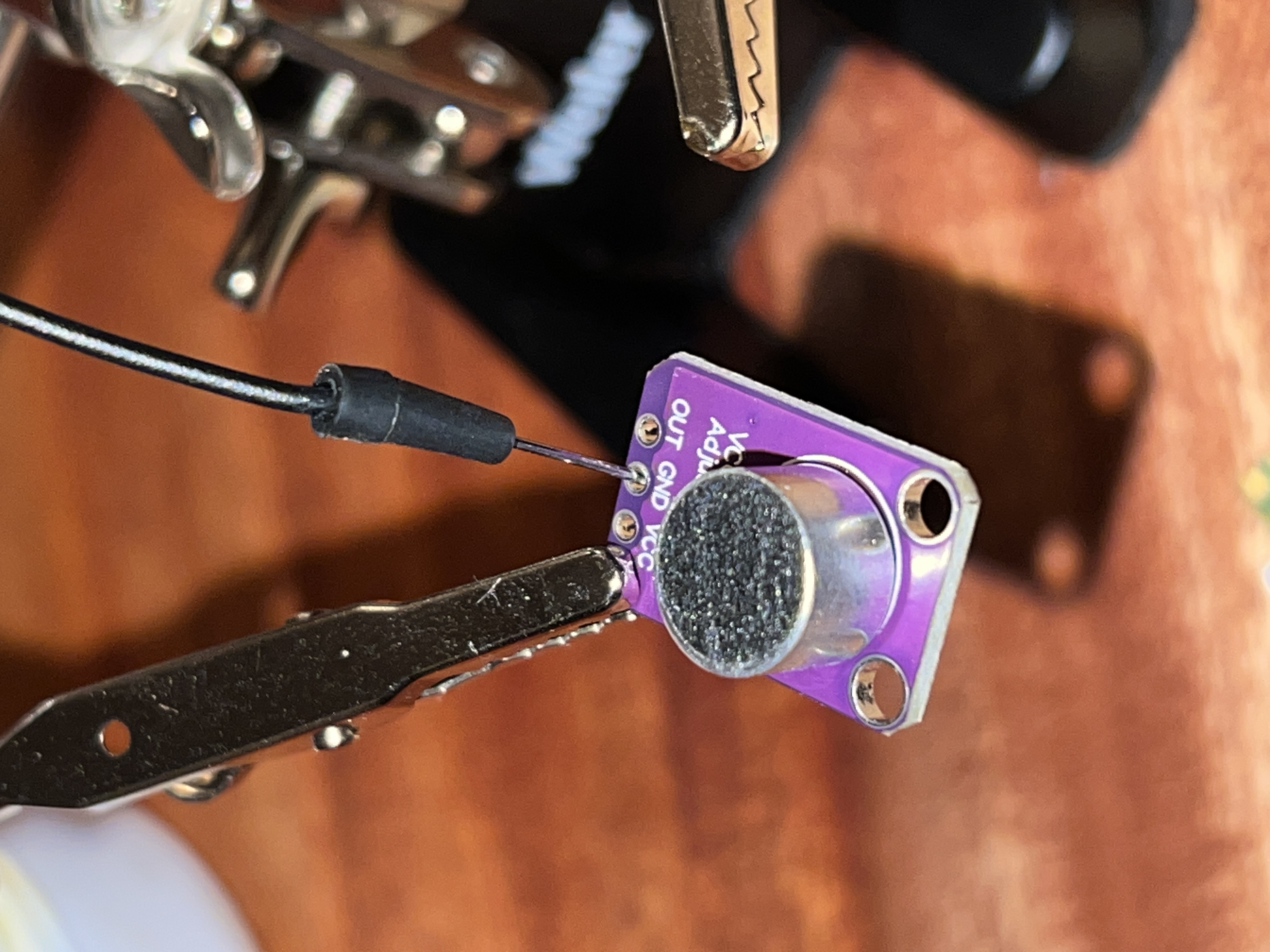 The first connection soldered on the microphone.