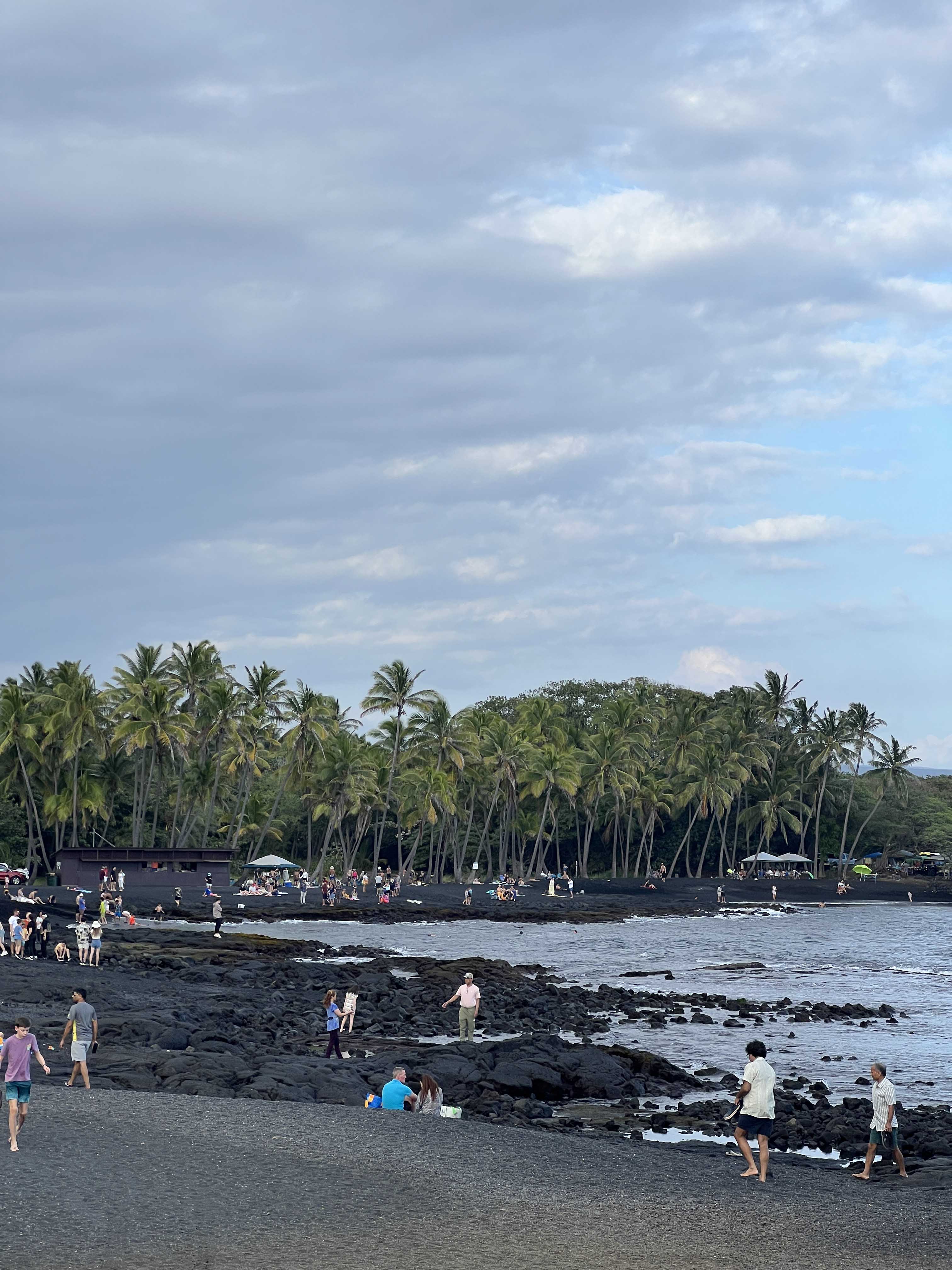 A busy view of Punaluʻu Beach.