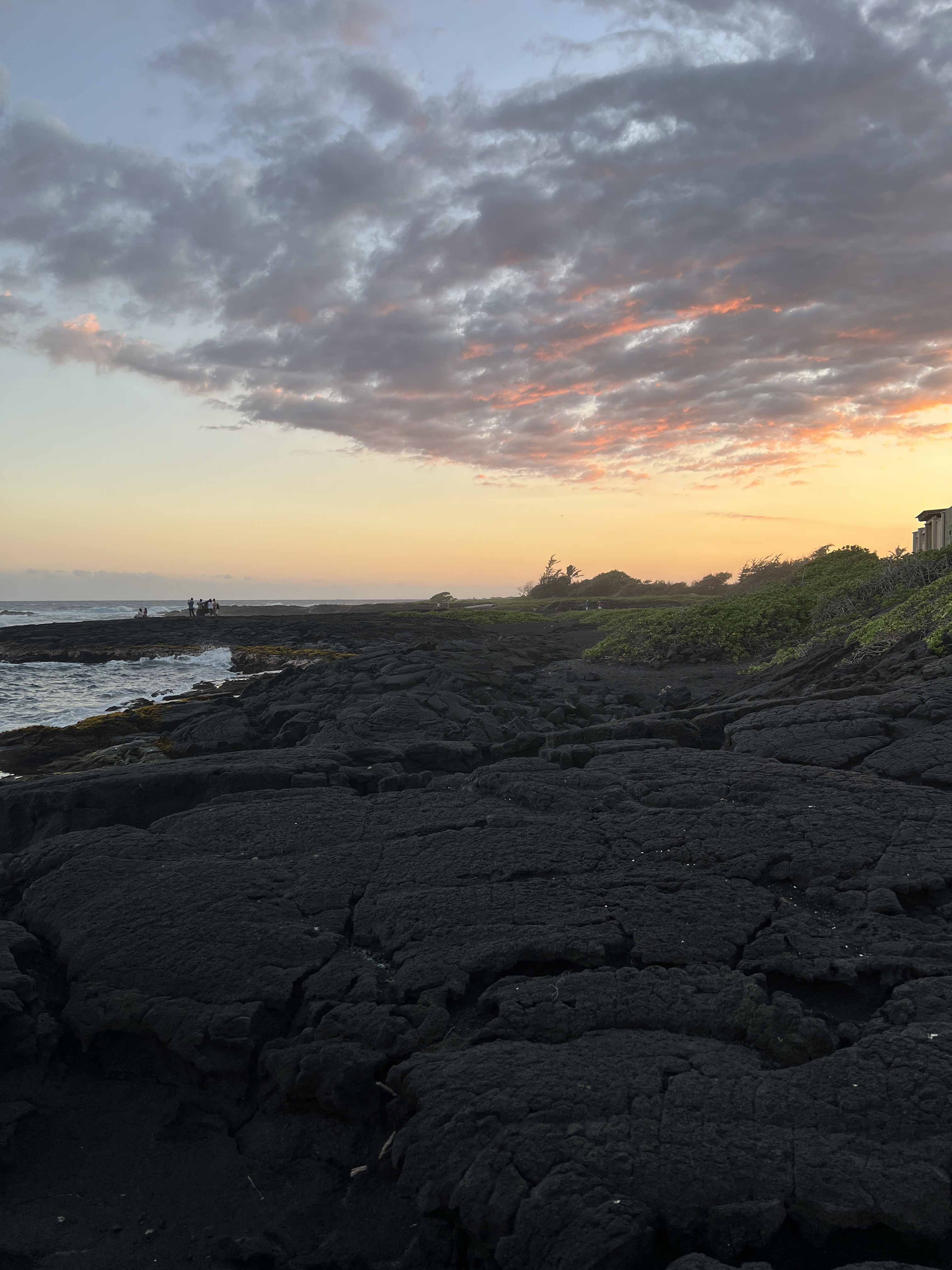 The sun setting over the basalt & park buildings.
