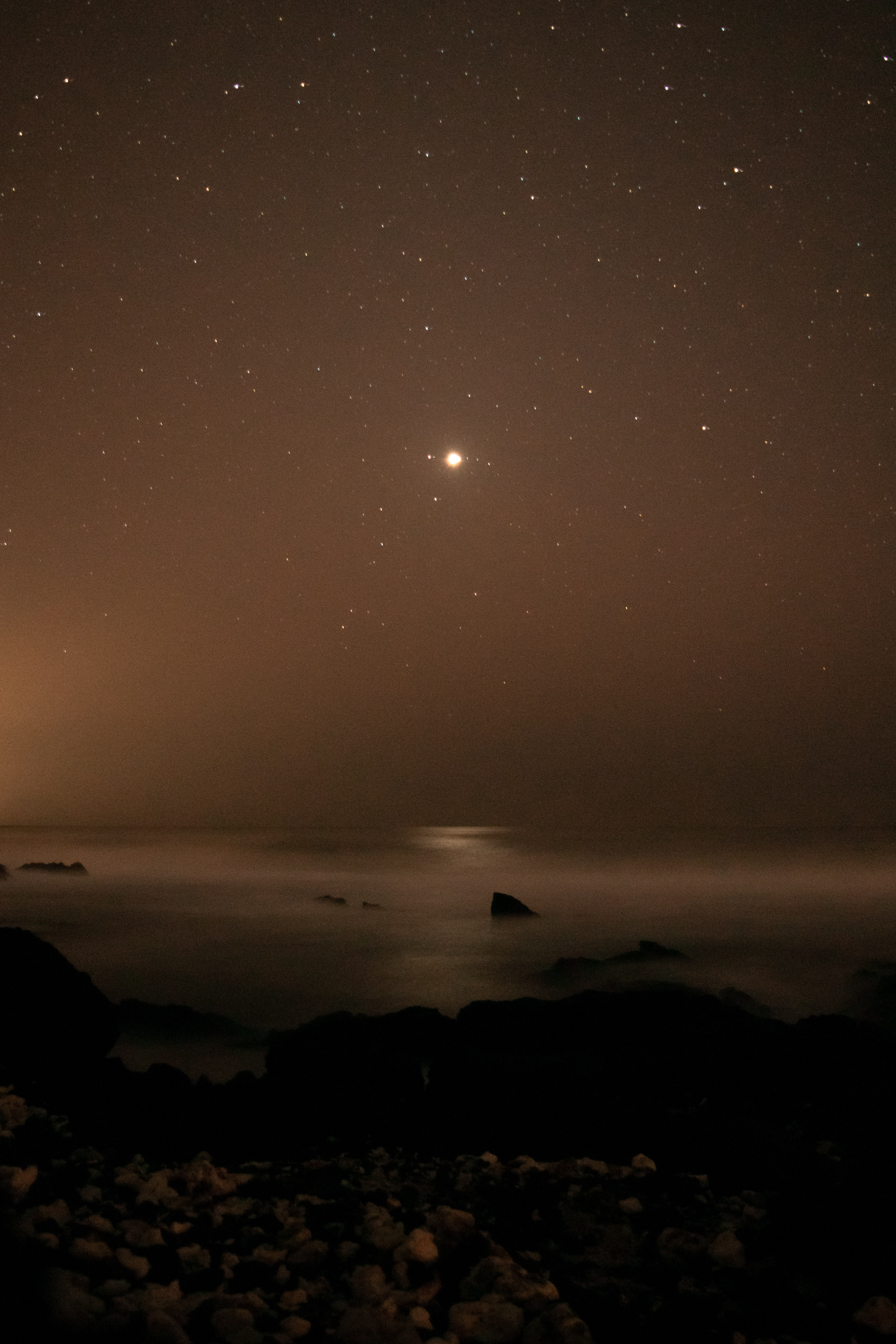 Venus shining over the ocean.