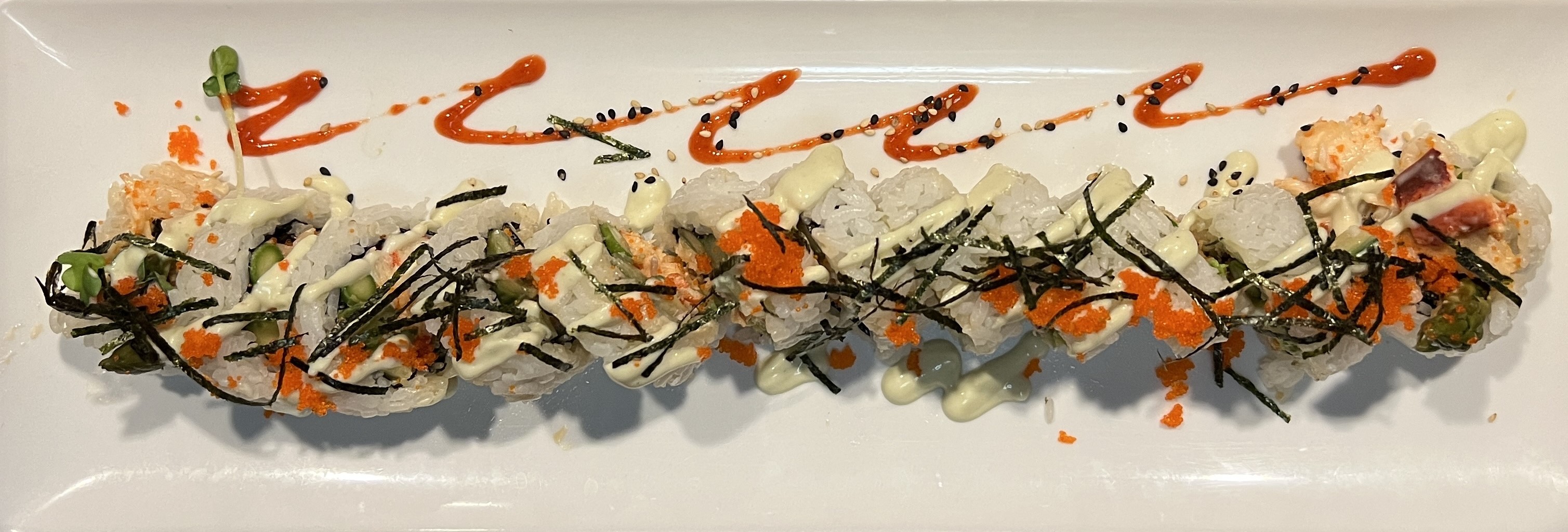A close up of one of the sushi rolls.
