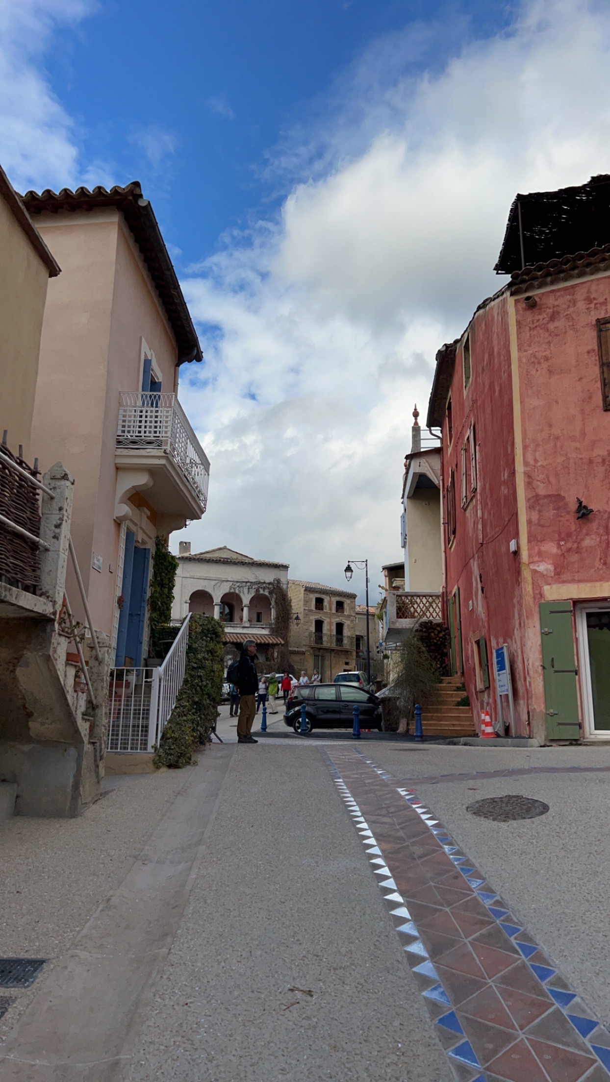 A cobblestone street in a village.