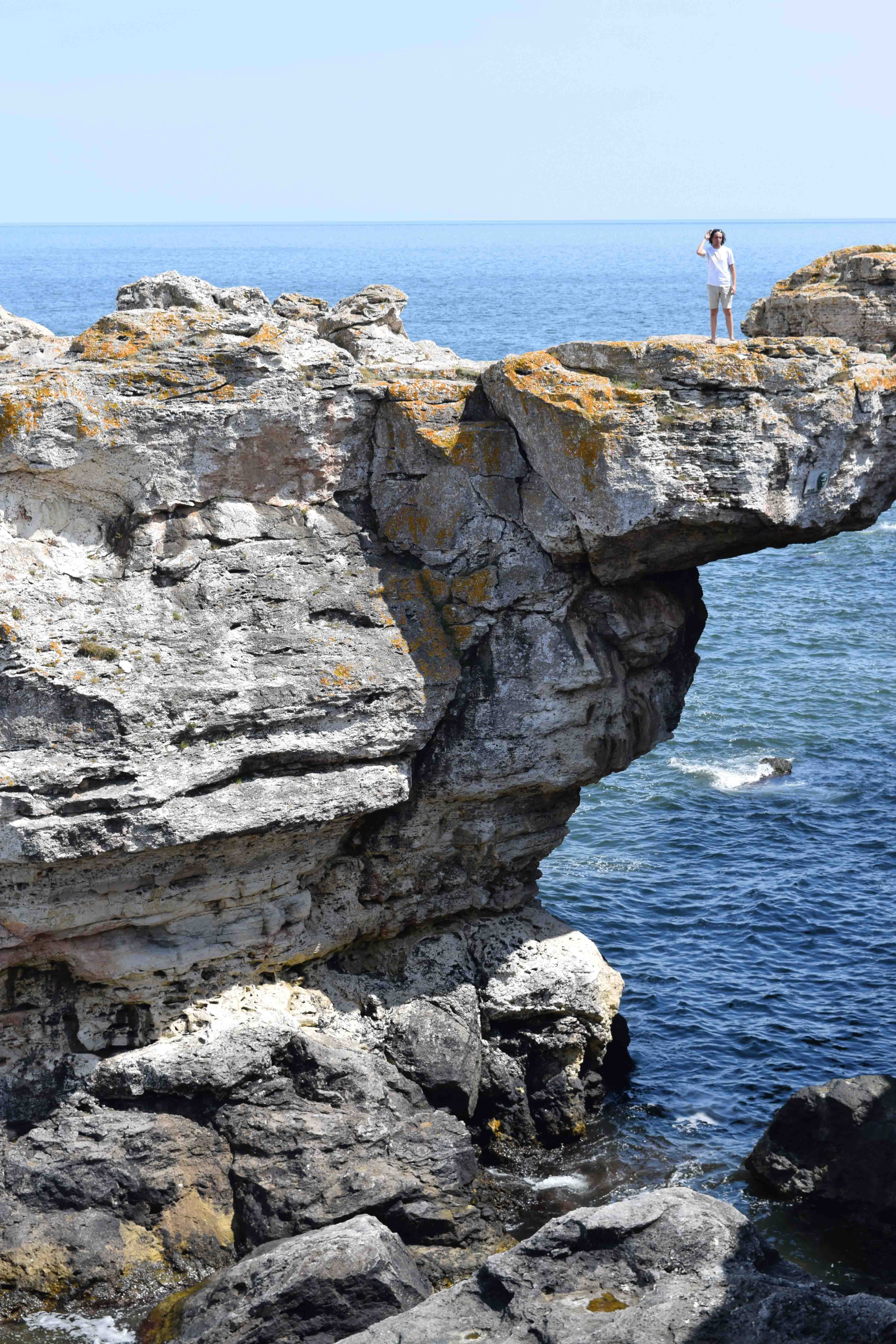 Boyan standing on the Stone arch in Tyulenovo over the Black Sea.